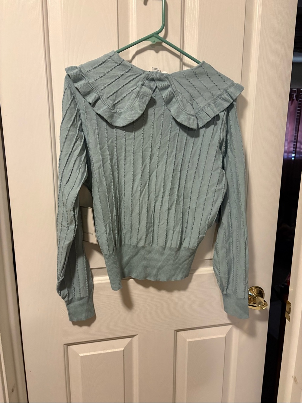 Calligraphic button front cardigan sweater